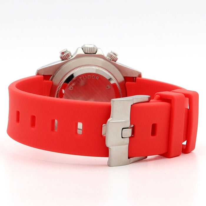 Red rubber watch strap with stainless steel clasp on a Tudor watch in Houston & Bellaire, TX