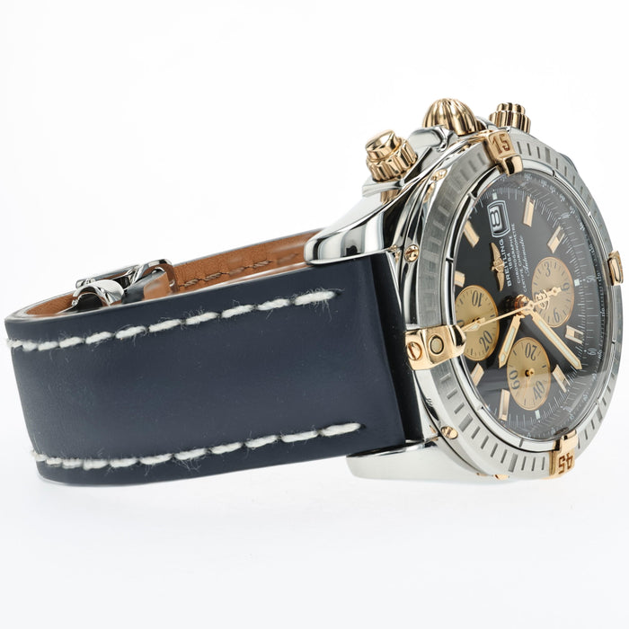 Breitling Chronomat Evolution Black Dial 18k Yellow Gold & Steel B13356