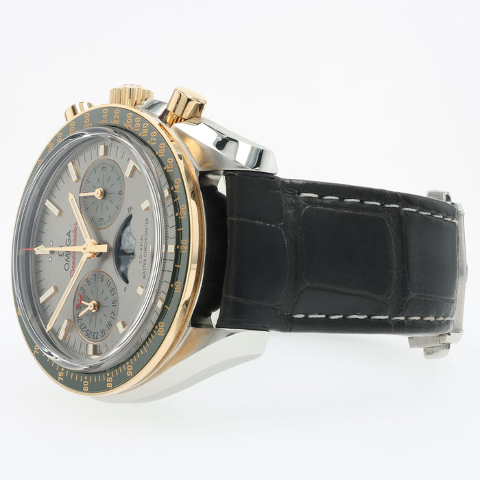 Omega Speedmaster 18K Yellow Gold Green Bezel & Steel 304.23.44.52.06.001
