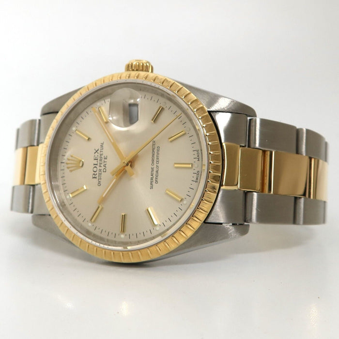 Rolex Oyster Perpetual Date 34MM 18kt Yellow gold & Steel Silver Dial 152223