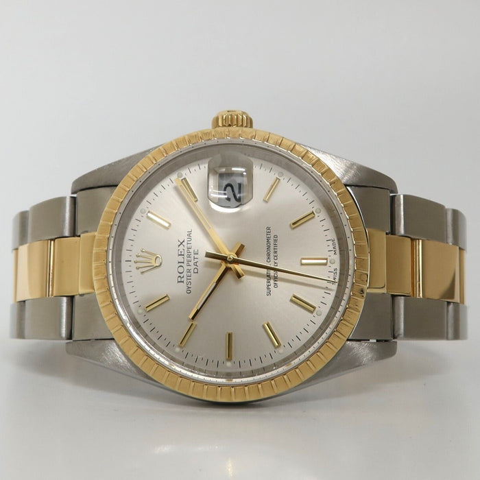 Rolex Oyster Perpetual Date 34MM 18kt Yellow gold & Steel Silver Dial 152223